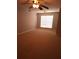 Spacious bedroom with neutral walls, carpet flooring, a ceiling fan, and window at 3777 Harvest Dr, Decatur, GA 30034