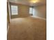 Bright bedroom with neutral walls, carpet flooring, and natural light at 3777 Harvest Dr, Decatur, GA 30034