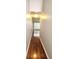 Hallway with hardwood floors and a window at the end at 3777 Harvest Dr, Decatur, GA 30034