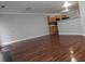 Living room with hardwood floors, leading to a kitchen at 3777 Harvest Dr, Decatur, GA 30034