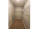 Functional walk-in closet with built-in shelving maximizes space and organization at 3777 Harvest Dr, Decatur, GA 30034