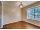 Cozy dining area featuring wood floors and a decorative light fixture at 6593 Sleepy Hollow Ln, Morrow, GA 30260