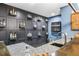 Wet bar with wood countertop, unique shelving, and custom features for stylish entertaining at 101 Fernwood Dr, Woodstock, GA 30188