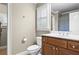 Bathroom with a single sink vanity and a toilet room with a shower at 101 Fernwood Dr, Woodstock, GA 30188