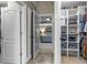 Walk-in closet showing shelving and hanging storage with view into bedroom at 101 Fernwood Dr, Woodstock, GA 30188