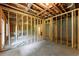 Framed unfinished basement ready for customizations; with exterior door and windows at 1420 Coretta Bnd, Atlanta, GA 30318