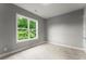 A bright bedroom features a big window at 1420 Coretta Bnd, Atlanta, GA 30318