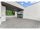 Expansive deck boasts modern design, sliding glass doors, and partial enclosure at 1420 Coretta Bnd, Atlanta, GA 30318
