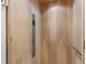 Interior of residential elevator featuring light wood paneling and controls at 1420 Coretta Bnd, Atlanta, GA 30318