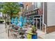 Charming pub with outdoor seating under umbrellas and a view of the neighborhood at 1420 Coretta Bend, Atlanta, GA 30318