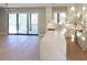 Open floor plan kitchen features a large center island, access to deck, and designer lighting at 1420 Coretta Bend, Atlanta, GA 30318
