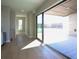 Bright living room showcasing sliding glass doors to a spacious outdoor deck and patio at 1420 Coretta Bend, Atlanta, GA 30318