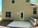 Exterior view of the back of the house with windows and a door at 3432 Sumter Pl, Decatur, GA 30034
