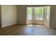 Bright living room with hardwood floors and a bay window at 3432 Sumter Pl, Decatur, GA 30034