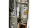 Image shows the home's hot water heater and furnace in the utility area at 3432 Sumter Pl, Decatur, GA 30034