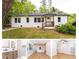 Charming home with a fresh exterior, green lawn, and welcoming front porch at 4215 Sherwood Ave, Decatur, GA 30035