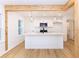 Kitchen with stylish pendant lights, stainless appliances, and hardwood floors at 4215 Sherwood Ave, Decatur, GA 30035