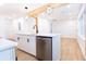 View of the kitchen island with modern appliances and stainless dishwasher at 4215 Sherwood Ave, Decatur, GA 30035