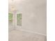 Bright bedroom with large windows providing natural light, features decorative lighting fixture at 732 Sweet Gum Way, Canton, GA 30115