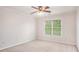 Clean bedroom featuring large windows, ceiling fan, and neutral-colored walls at 732 Sweet Gum Way, Canton, GA 30115