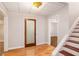 Hallway showing stairs with hardwood floors and view to the downstairs area at 732 Sweet Gum Way, Canton, GA 30115