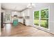 Eat-in kitchen with stainless appliances, an island, and a view of backyard at 732 Sweet Gum Way, Canton, GA 30115