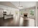 Open concept living room and kitchen area with plenty of natural light at 74 Stonegate Ct, Dallas, GA 30157