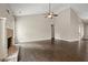 Spacious living room features a classic brick fireplace and hardwood floors at 74 Stonegate Ct, Dallas, GA 30157