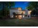 Well-maintained backyard featuring a deck and patio, perfect for outdoor living and entertaining at 1725 Redbud Way, Cumming, GA 30041