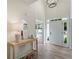 Inviting foyer with light-colored walls, hardwood floors and contemporary decor at 1725 Redbud Way, Cumming, GA 30041