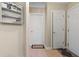 Hallway with multiple doors and extra storage space at 221 Ashford Cir, Atlanta, GA 30338