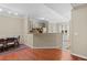 Cozy dining area adjacent to the kitchen, featuring modern lighting and stylish decor at 221 Ashford Cir, Atlanta, GA 30338