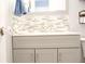 Bathroom features modern vanity with a stylish mosaic tile backsplash, offering a clean, fresh, and inviting space at 2568 Morning Glory Pl, Lawrenceville, GA 30044
