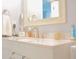 Bathroom features a light pink marble countertop and a large ornate mirror above the sink at 2568 Morning Glory Pl, Lawrenceville, GA 30044