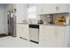 Bright kitchen featuring stainless steel appliances and updated countertops at 2568 Morning Glory Pl, Lawrenceville, GA 30044