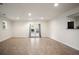 Spacious basement area with a walkout entrance and neutral finishes at 2729 Lanier Dr, Snellville, GA 30078