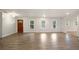 Spacious open living area with new flooring, fresh paint, and natural lighting at 2729 Lanier Dr, Snellville, GA 30078