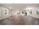 Airy living room with open layout, new flooring, and natural light at 2729 Lanier Dr, Snellville, GA 30078