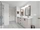 Modern bathroom with a double sink vanity and tiled floors at 3493 Monarch Ave, Duluth, GA 30096