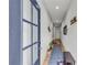 Inviting entryway with wood floors, white walls, and modern decor, creating a welcoming ambiance at 3493 Monarch Ave, Duluth, GA 30096