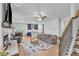 Inviting living space featuring hardwood floors, a cozy fireplace, and an open floor plan at 3493 Monarch Ave, Duluth, GA 30096