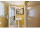 Charming bathroom featuring a pedestal sink, tiled floor, and glass-enclosed shower stall at 3672 Haddon Hall Rd, Atlanta, GA 30327