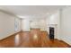 Spacious living room features hardwood floors, a fireplace, and bright natural light at 3672 Haddon Hall Rd, Atlanta, GA 30327