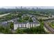 Apartment aerial view surrounded by trees and city skyline in the distance at 970 Sidney Marcus Ne Blvd # 2403, Atlanta, GA 30324