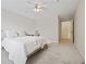 Bedroom with soft carpet, neutral colors, a ceiling fan, and a closet nearby at 970 Sidney Marcus Ne Blvd # 2403, Atlanta, GA 30324