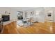 Bright living room with fireplace, wood floors, and sliding doors to a balcony at 970 Sidney Marcus Ne Blvd # 2403, Atlanta, GA 30324