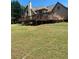 Expansive backyard featuring a large wooden deck perfect for outdoor gatherings and entertaining at 1173 Jimson Se Cir, Conyers, GA 30013