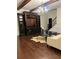 Elegant living room with hardwood floors, custom built-ins, and designer chandelier at 1173 Jimson Se Cir, Conyers, GA 30013