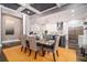 Open-concept kitchen and dining area features modern design and ample natural light for comfortable Gathering living at 850 Cog Hl, Mcdonough, GA 30253
