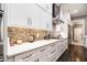 Well-equipped kitchen featuring modern appliances, custom cabinetry, and stylish backsplash for cooking enthusiasts at 850 Cog Hl, Mcdonough, GA 30253